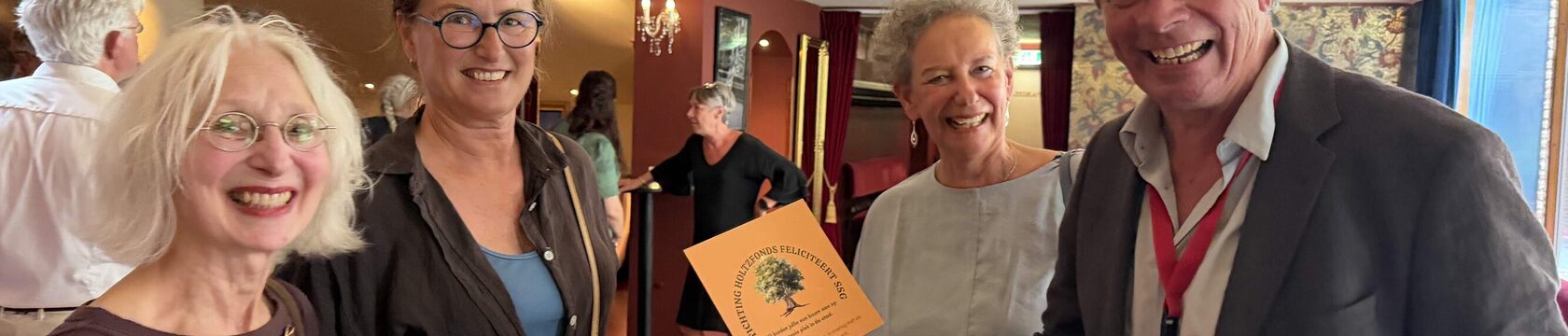 Holzfonds feliciteert SSG